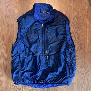 Women’s navy Patagonia puffer vest,  size M